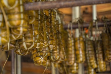 Focus Vietnamese Sticky Rice Cake (tet cake) hang in shelves after hard-boiled, Vietnamese traditional new year food. the most important food of Vietnamese lunar new year Tet.