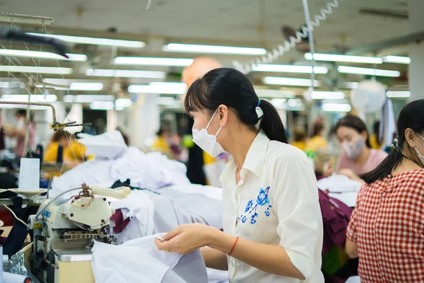 Ba Ria, VIETNAM - MAR 18 2022 Textile cloth factory working