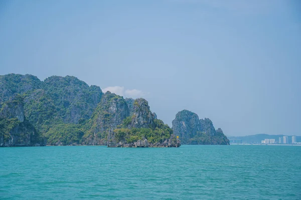 stock image Scenic view of rock island in HaLong Bay, Vietnam, Southeast Asia. UNESCO World Heritage Site. Mountain islands at Ha Long Bay. Beautiful landscape Popular asian landmark famous destination of Vietnam