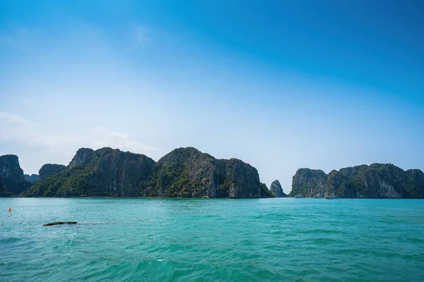 stock image Scenic view of rock island in HaLong Bay, Vietnam, Southeast Asia. UNESCO World Heritage Site. Mountain islands at Ha Long Bay. Beautiful landscape Popular asian landmark famous destination of Vietnam