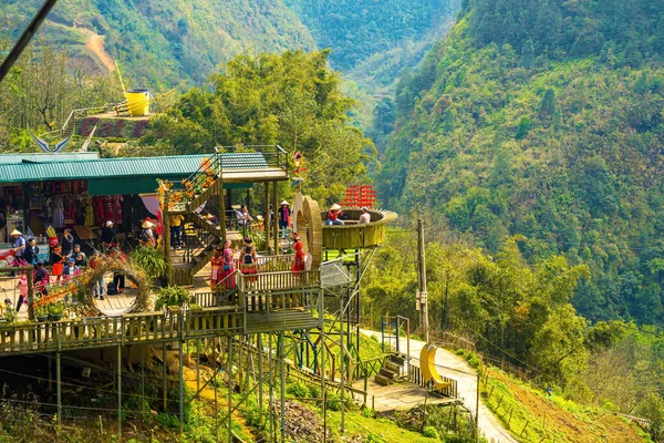 Stock image Lao Cai, Vietnam- MAR 12 2023: Beautiful scenery of Cat Cat village,a highland cultural village in Sapa. Street in Cat Cat Hmong village by Sapa with market full of traditional colorful clothes