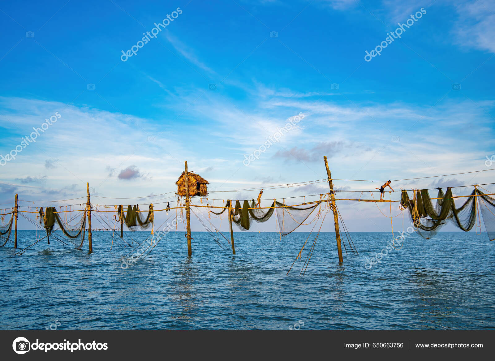 Two Fishermen Casting Nets Fishing Poles Beautiful Sunrise