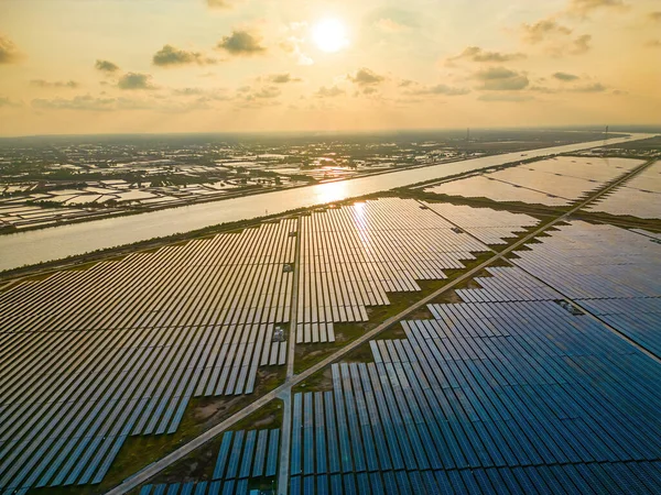 stock image Top view of Solar panels on farm. Alternative source of electricity. solar panels absorb sunlight as a source of energy to generate electricity creating sustainable energy. Eco concept