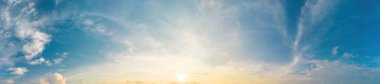 Beautiful view of blue sky with clouds at sunrise. Partly cloudy.Background cloud summer. Cloud summer. Sky cloud clear with sunset. Natural sky cinematic beautiful yellow and white texture background