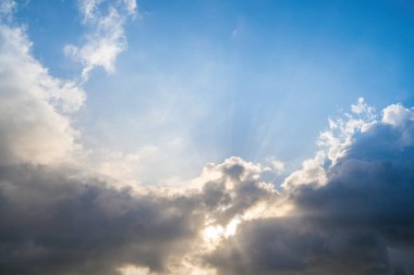 Beautiful view of blue sky with clouds at sunrise. Partly cloudy.Background cloud summer. Cloud summer. Sky cloud clear with sunset. Natural sky cinematic beautiful yellow and white texture background