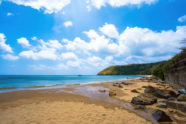 stock image Beautiful Dam Trau beach in Con Dao island. Bottom view Airplane is landing. Wild beach Con Dao island from above with blue sea and mountain, so many cloud.