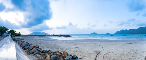 stock image Panoramic coastal Con Dao island view from above, with waves, coastline ,clear sky and road, blue sea and mountain.