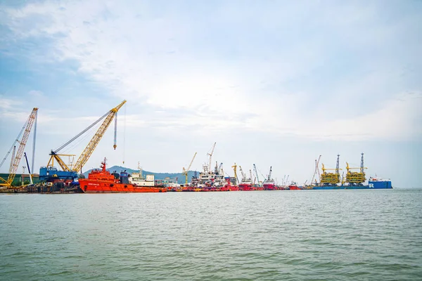 stock image Big boat crane to load containers, this is Cai Mep Port the big harbor for trade service industry, oil extraction ship.