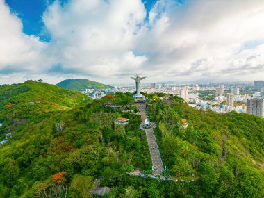 Top view of Vung Tau with statue of Jesus Christ on Mountain . the most popular local place. Christ the King, a statue of Jesus. Travel concept.