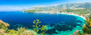 amazing blue bay in Himare in Albania clipart