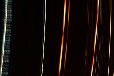 Gece sürüşünün hareket bulanıklığı ile soyut arkaplan