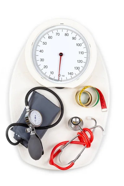 Stethoscoop Bloeddruk Monitor Naaister Meter Geplaatst Een Schaal Een Witte — Stockfoto