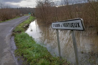 Normandy, France, Europe : Exterior photo view water floods due to climate change in fields creating damage disaster in agriculture environement clipart