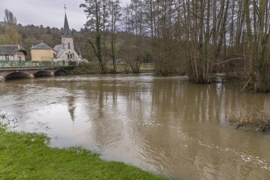 Normandy, France, Europe : Exterior photo view water floods due to climate change in fields creating damage disaster in agriculture environement clipart