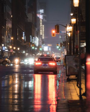 car stopped on a wet street
