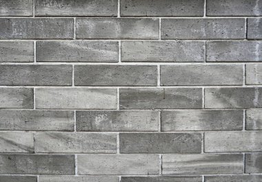 Pis gri tuğlalı arka plan bina dış yapı malzemesi yatay arkaplan üzerinde izole.