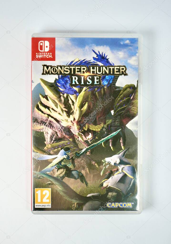 Jakarta, Indonesia - November 2th, 2024 - Monster Hunter Rise Nintendo Switch game container isolated on vertical white background.