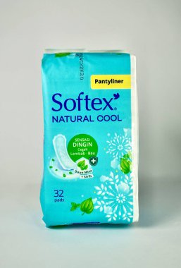 Jakarta, Indonesia - November 21th, 2024 - Softex brand natural cool pantyliner product packaging isolated on vertical white background. clipart