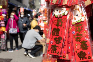 2023 Jan 31,Hong Kong.Buildings under construction in the newly developed area of Kowloon City against the background of the Lion Rock