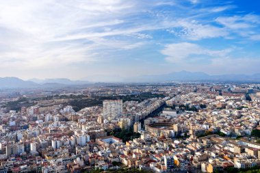 October 2022 - Alicante, Spain - Aerial view of the Spanish city of Alicante on the shores of the turquoise Mediterranean Sea on a sunny day
