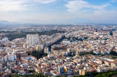 October 2022 - Alicante, Spain - Aerial view of the Spanish city of Alicante on the shores of the turquoise Mediterranean Sea on a sunny day