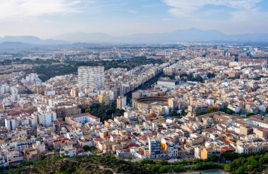 October 2022 - Alicante, Spain - Aerial view of the Spanish city of Alicante on the shores of the turquoise Mediterranean Sea on a sunny day
