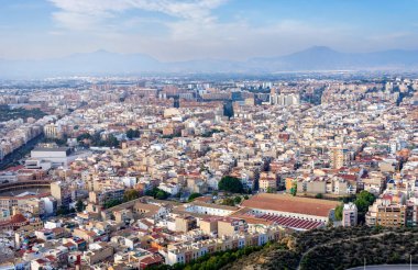 October 2022 - Alicante, Spain - Aerial view of the Spanish city of Alicante on the shores of the turquoise Mediterranean Sea on a sunny day