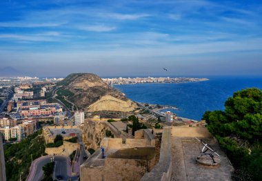 October 2022 - Alicante, Spain - Aerial view of the Spanish city of Alicante on the shores of the turquoise Mediterranean Sea on a sunny day