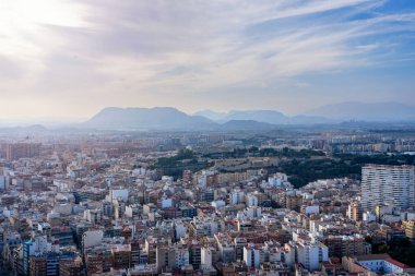 October 2022 - Alicante, Spain - Aerial view of the Spanish city of Alicante on the shores of the turquoise Mediterranean Sea on a sunny day