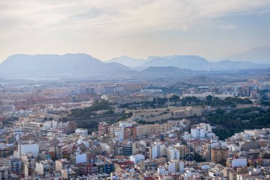 October 2022 - Alicante, Spain - Aerial view of the Spanish city of Alicante on the shores of the turquoise Mediterranean Sea on a sunny day