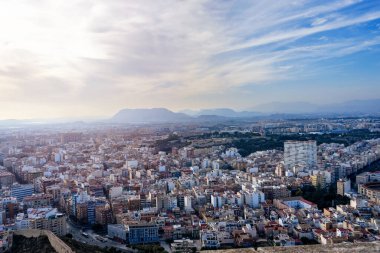 October 2022 - Alicante, Spain - Aerial view of the Spanish city of Alicante on the shores of the turquoise Mediterranean Sea on a sunny day