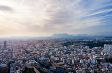 October 2022 - Alicante, Spain - Aerial view of the Spanish city of Alicante on the shores of the turquoise Mediterranean Sea on a sunny day