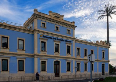 October 2022 - Alicante, Spain - Spanish city of Alicante, purple station building at night