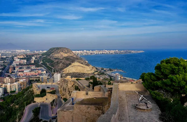 October 2022 - Alicante, Spain - Aerial view of the Spanish city of Alicante on the shores of the turquoise Mediterranean Sea on a sunny day