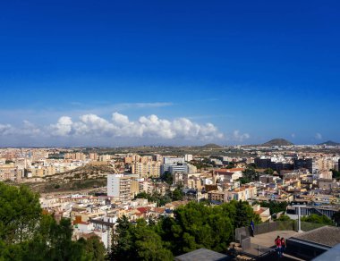 October 2022 - Cartagena, Spain- Spanish city of Cartagena on the shores of the turquoise Mediterranean sea from a bird's eye view on a sunny day
