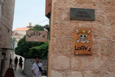 Step into Luffy's Coffee Shop in Budva and embark on a delightful journey inspired by the iconic Straw Hat logo. clipart