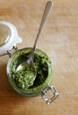 Homemade basil pesto (Genoese pesto). Mediterranean dish.Vegetarian food. Directly above.