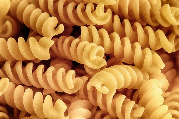 Tradiční Italské Těstoviny Nevařené Fusilli Těstoviny Pozadí Moučné Výrobky Zdravé — Stock fotografie