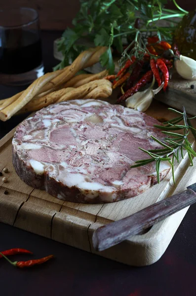 stock image Typical Italian salami. Tuscan Soprassata salami for snacks, sandwiches on wooden cutting board. Overhead view.