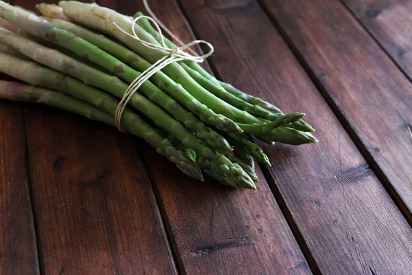 stock image Fresh asparagus isolated on wooden background. Close-up. Healthy food. Spring food. Copy space.