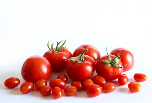 Stock image A group of fresh tomatoes isolated on white background. Healthy and vegetarian food. Copy space.