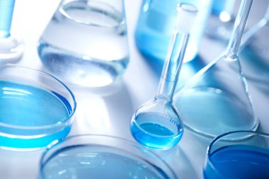 Science laboratory with beaker and dropper