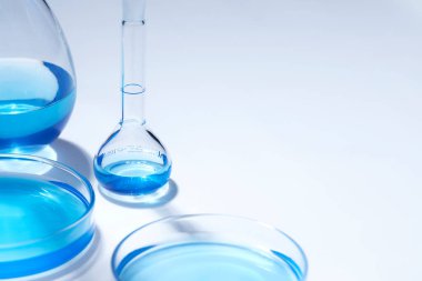 Science laboratory with beaker and dropper