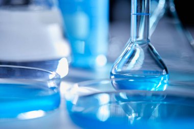 Science laboratory with beaker and dropper