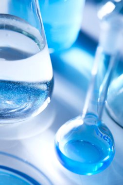 Science laboratory with beaker and dropper