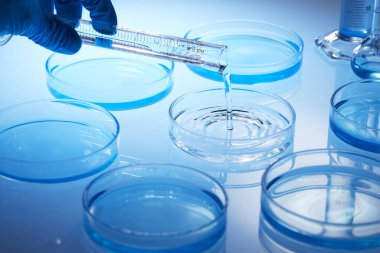 Science laboratory with beaker and dropper