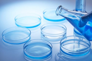 Science laboratory with beaker and dropper