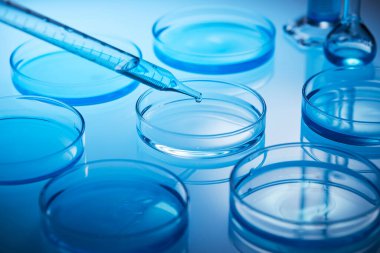 Science laboratory with beaker and dropper