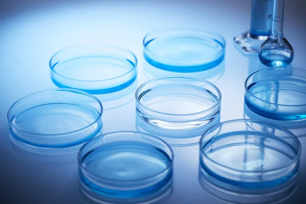 Science laboratory with beaker and dropper