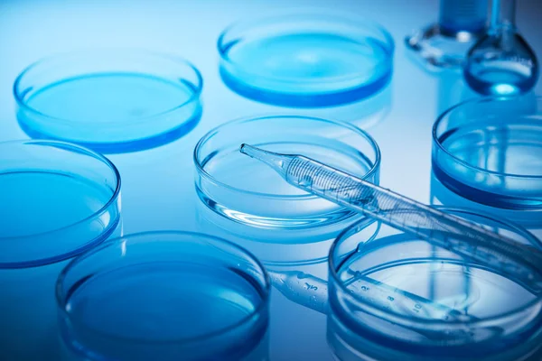 Science laboratory with beaker and dropper